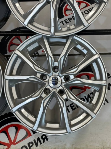 Диски литые Nissan R18	5*114,3	7J ET45 ЦО 66,1