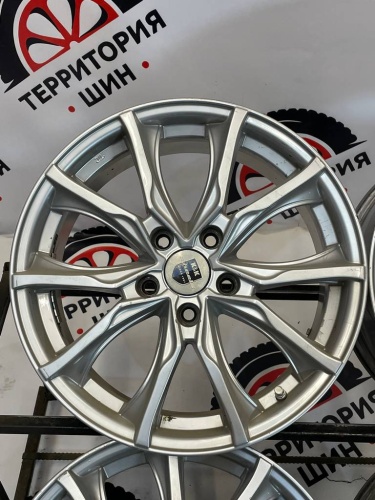 Диски литые Nissan R18	5*114,3	7J ET45 ЦО 66,1